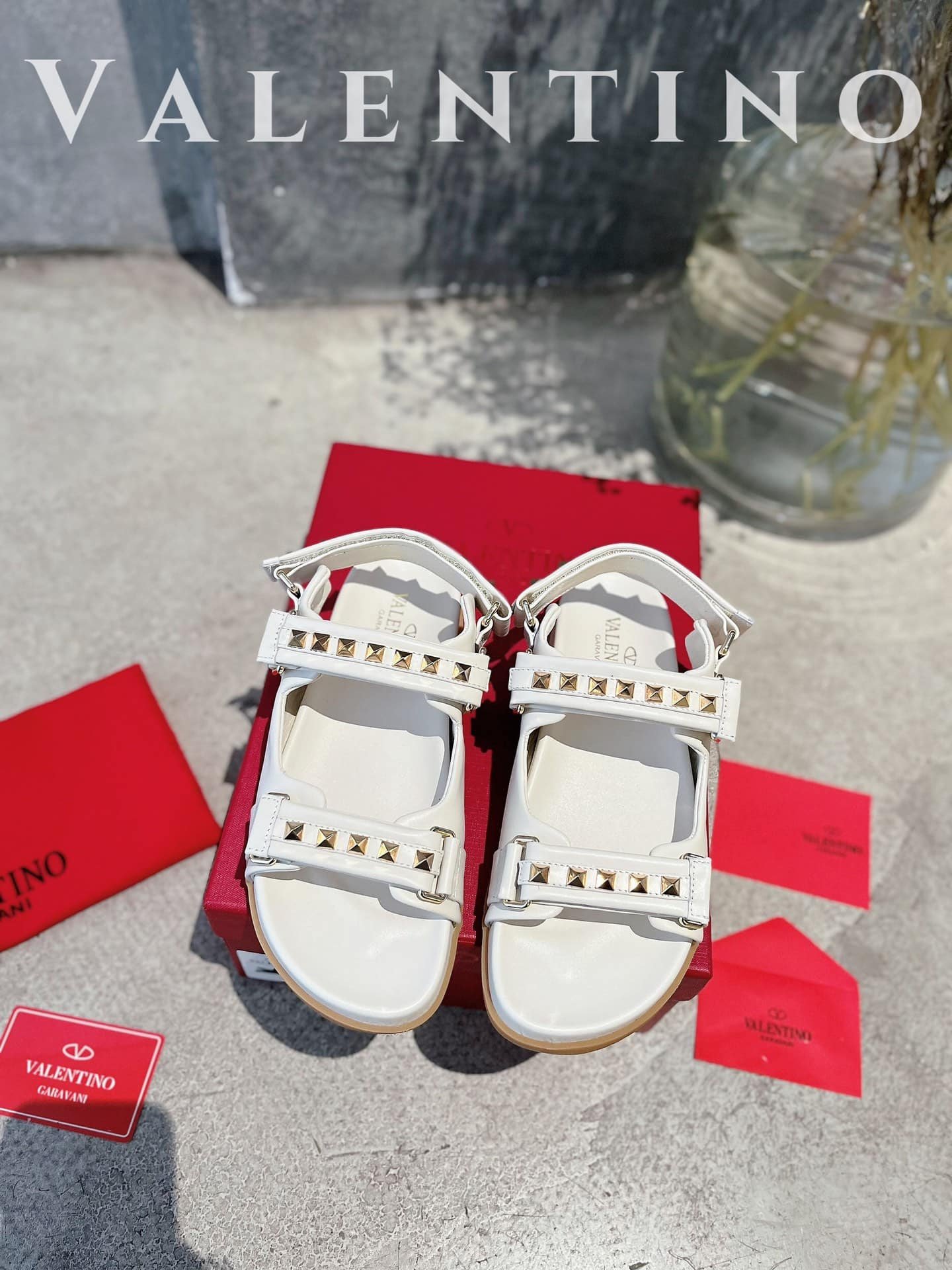 Va1e*ntin0 Garavani Rockstud Flat Sandal In Nappa Leather For Woman In White